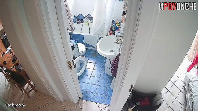 After cleaning the apartment, the girl pulls down her panties and sits down to pee