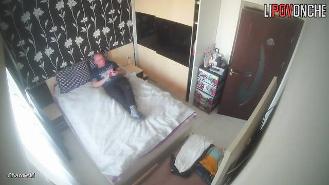 An aroused young brunette passionately desires sex with her older husband