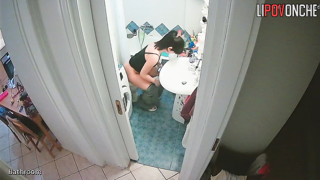 Brunette carefully wipes her wet pussy and examines her panty liner