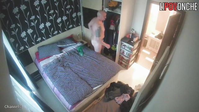 A bald older man takes off his underpants to seduce his young wife with his bare cock