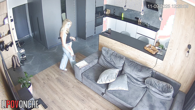 A cute blonde who just peed is washing her tender shaved pussy