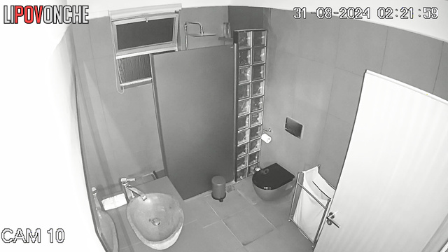 The cheerful blonde prefers to pee in the restroom with her phone in her hands