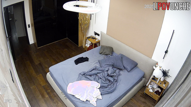 A naked man with a large, erect cock hides from his skinny wife to scare her