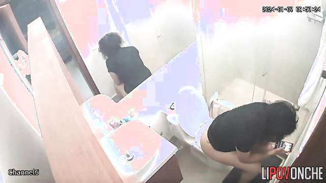 A compilation of videos showing a sexy brunette using the restroom