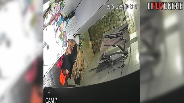 The blonde bares her tattooed butt as she sits down on the toilet