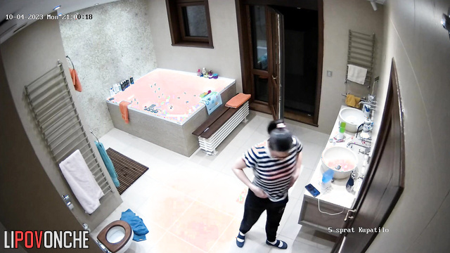 The girl threw the balcony door wide open just before sitting down on the toilet