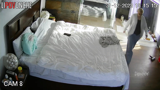 Busty naked blonde doing her morning routine (huge bedroom)