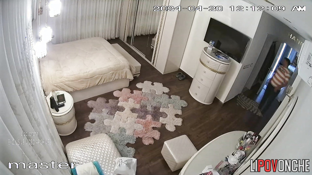 Couple hugging and teasing each other on the bed