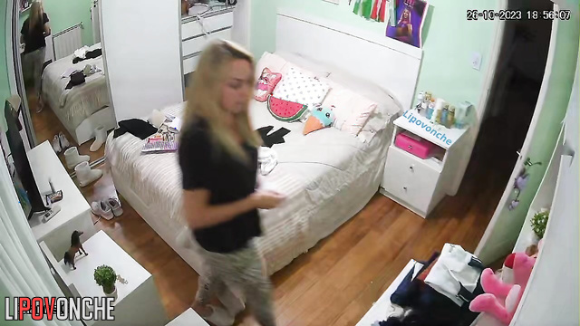 Young beauty with small boobs trying on new outfits
