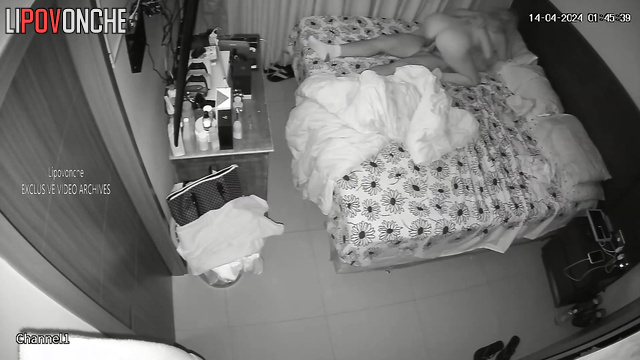 A pretty young blonde happily sits down on her husband's erect cock
