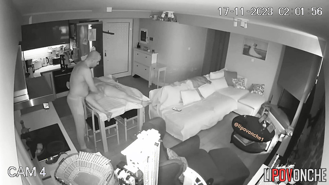 During a massage, a bald man plays with his naked wife's delicate labia