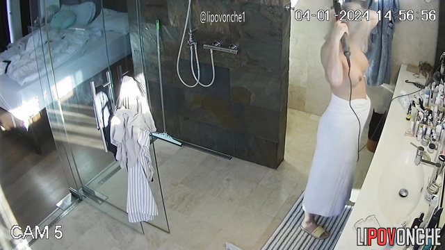 A gorgeous milf isn't shy about walking around naked in front of her fat girlfriend