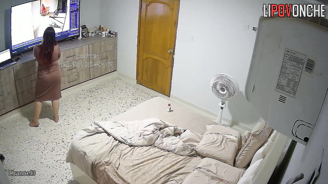 A chubby mommy selects porn movies from her collection to watch with her lover