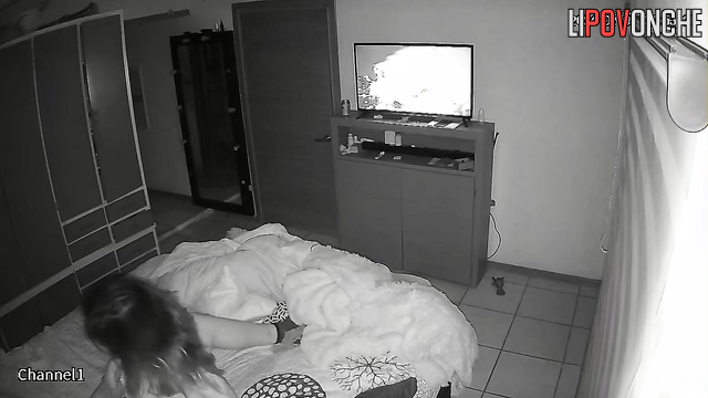 A naked brunette eagerly pulls her husband's T-shirt off while sitting on his cock