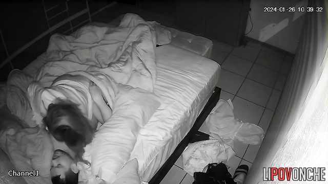 The sleepy husband pulls his wife's little hand toward his erect cock