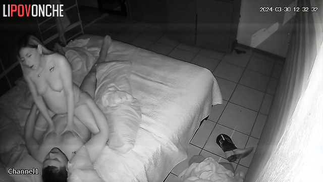 A young blonde gently plays with her sleeping husband's big cock and balls