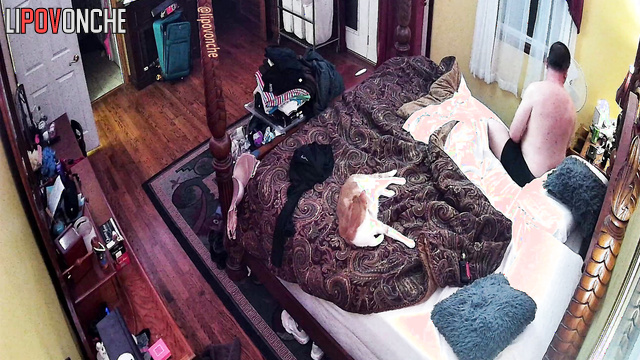 A naked redheaded wife gently gives her husband a back massage