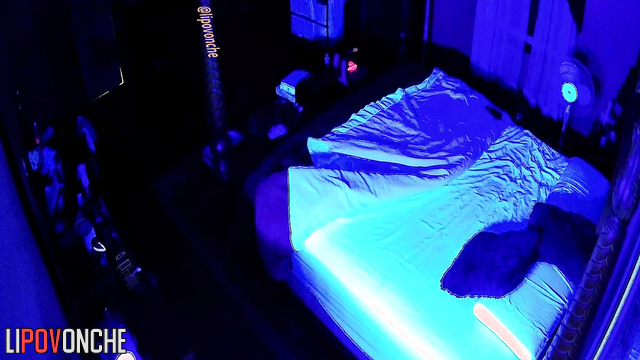 A redheaded cutie with bare breasts gets into bed with her husband