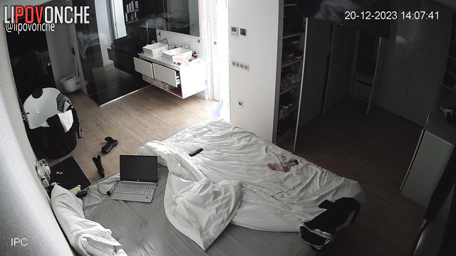 A hidden camera captured a sexy girl undressing completely before taking a shower