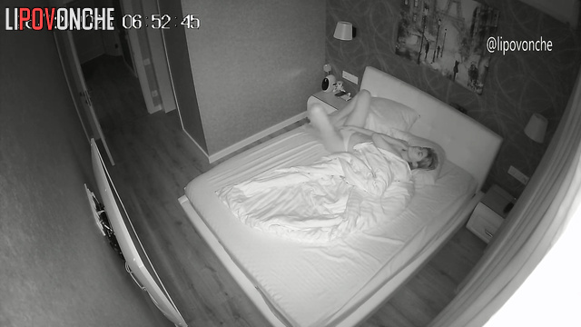 A sexy brunette wearing only panties just can't seem to wake up early in the morning