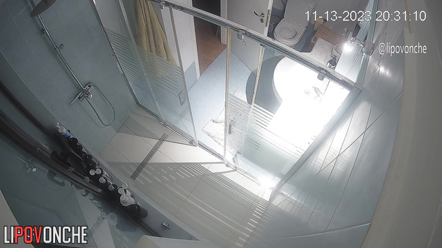 A husband secretly filmed his wife looking at her breasts and taking a shower