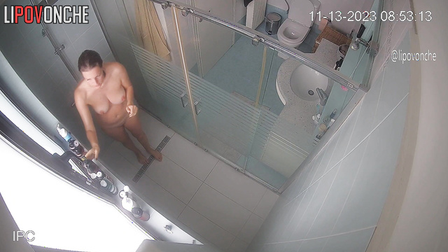 A sexy naked wife kicks her bearded husband out of the bathroom