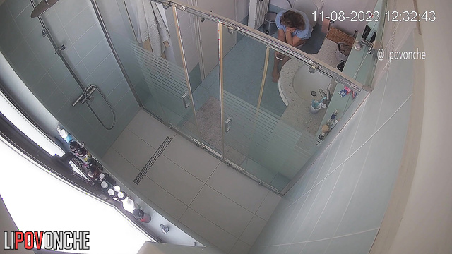 A tired mommy washes her sexy naked body under jets of water in the shower