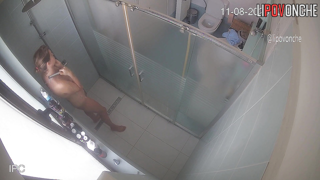A tired mommy washes her sexy naked body under jets of water in the shower