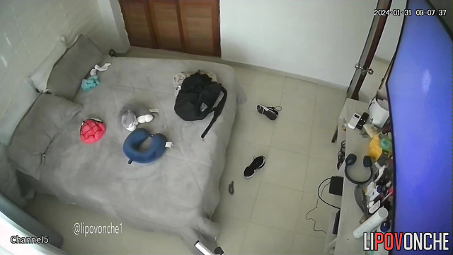 The busty cutie isn't shy about walking around naked in front of the cleaning lady