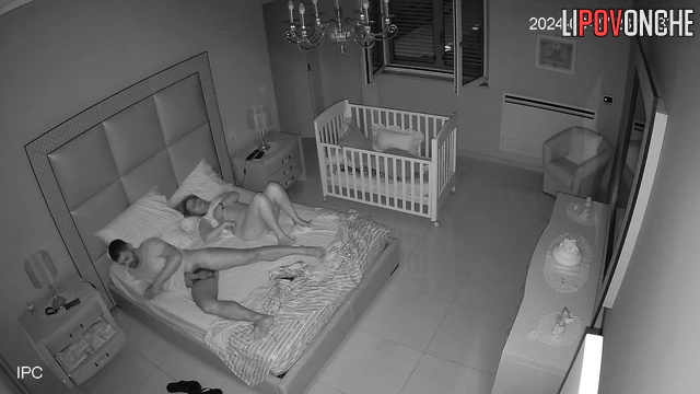 An unshaven man pushes his fingers deeper into his aroused wife's vagina