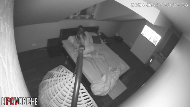 A naked brunette gently strokes a man's big cock and gives him a blowjob