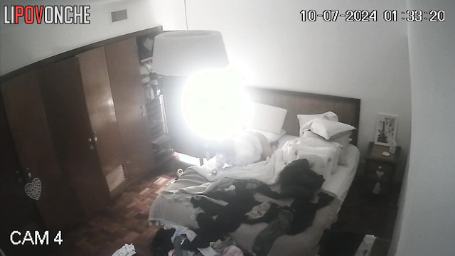 An excited blonde attaches a dildo to the pillow to get more pleasure