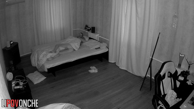 A skinny girl sleeping in bed showed her toned, naked butt to the camera