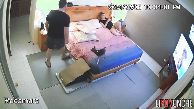 A pretty blonde took a break from watching TV to play with her husband's big cock