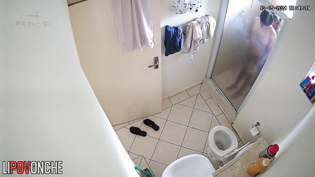 Couple washing each other in the shower right now