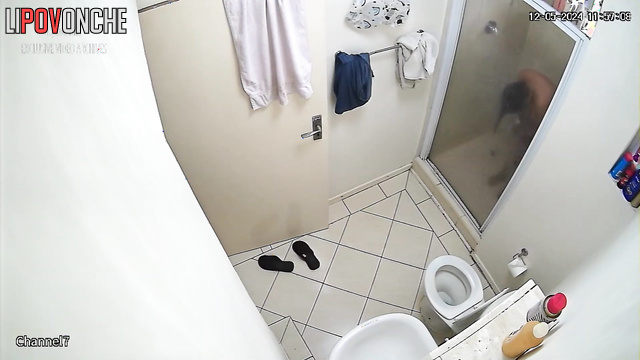 Couple washing each other in the shower right now