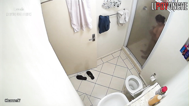 Couple washing each other in the shower right now