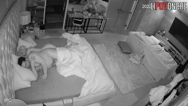 Blonde MILF touches her partner's small cock while sleeping in bed