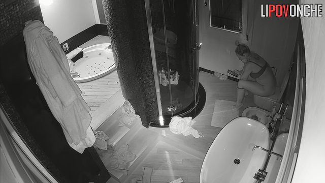 Leaked bathroom video of a sexy blonde relaxing in a hot tub
