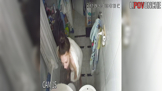 Sexy lady wipes her body with a towel & smears herself with oil
