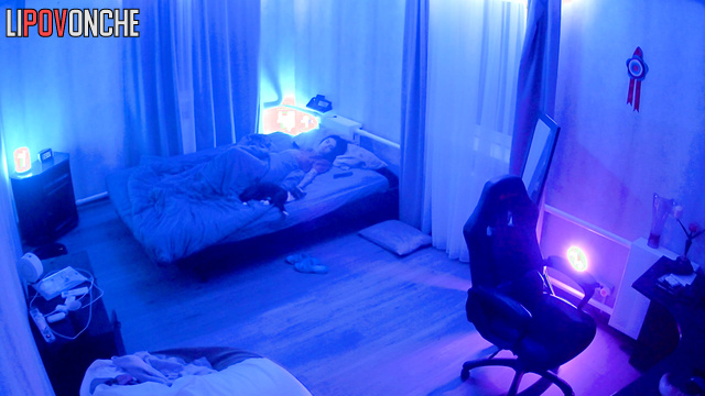 Comfortable pastime young long-haired brunette in a cozy room
