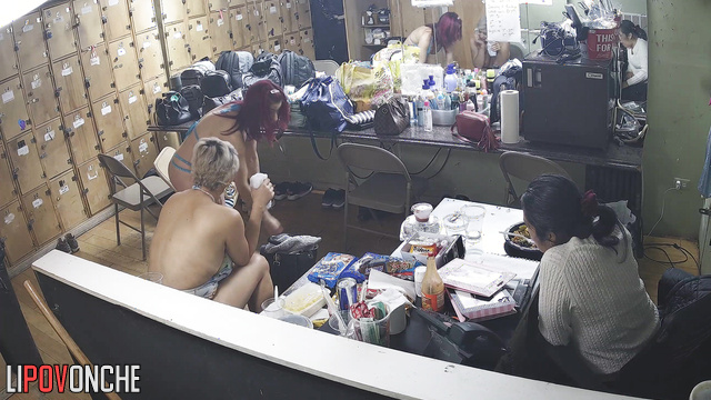 Strippers chatting with each other before the show