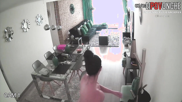 Brunette always smokes in the morning right in the living room