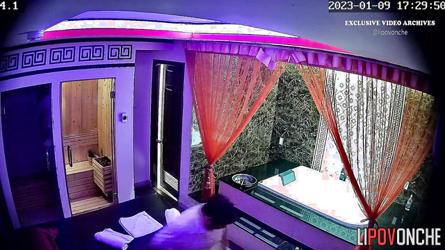 Tattooed Asian woman gives a sexy body massage to a client at Soapland