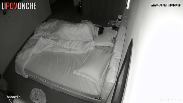 A young wife wakes up her sleeping husband by giving him an amazing blowjob