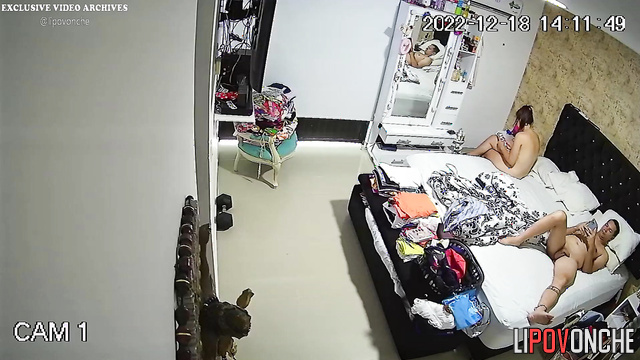 Spouses relaxing completely naked on the bed, spy cam