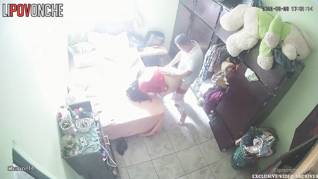Couple enjoys each other in a small, dirty apartment