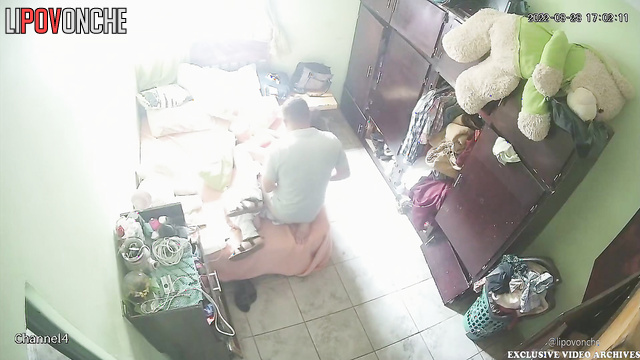 Couple enjoys each other in a small, dirty apartment
