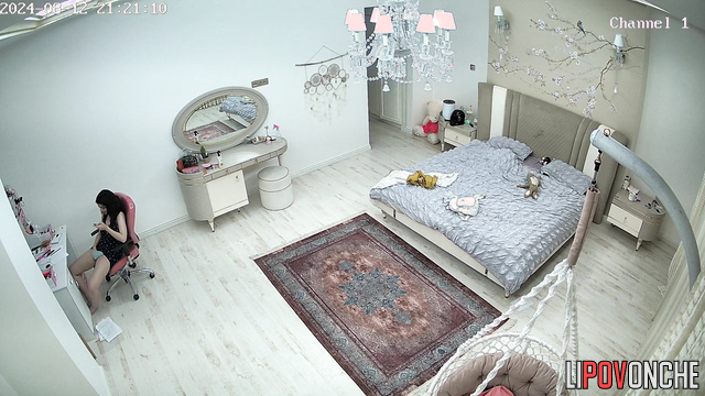 Young girl plays with her pussy while talking on the phone