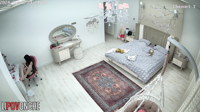 Young girl plays with her pussy while talking on the phone